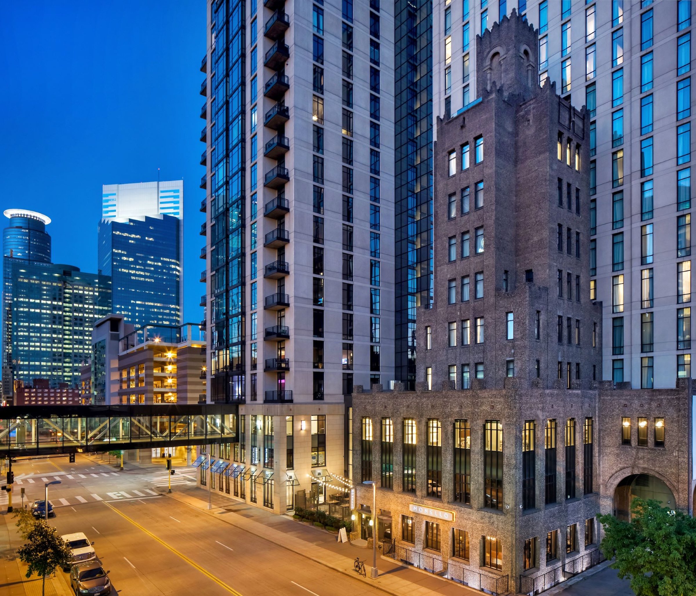 Glass links of hotel Ivy and its building in the evening view