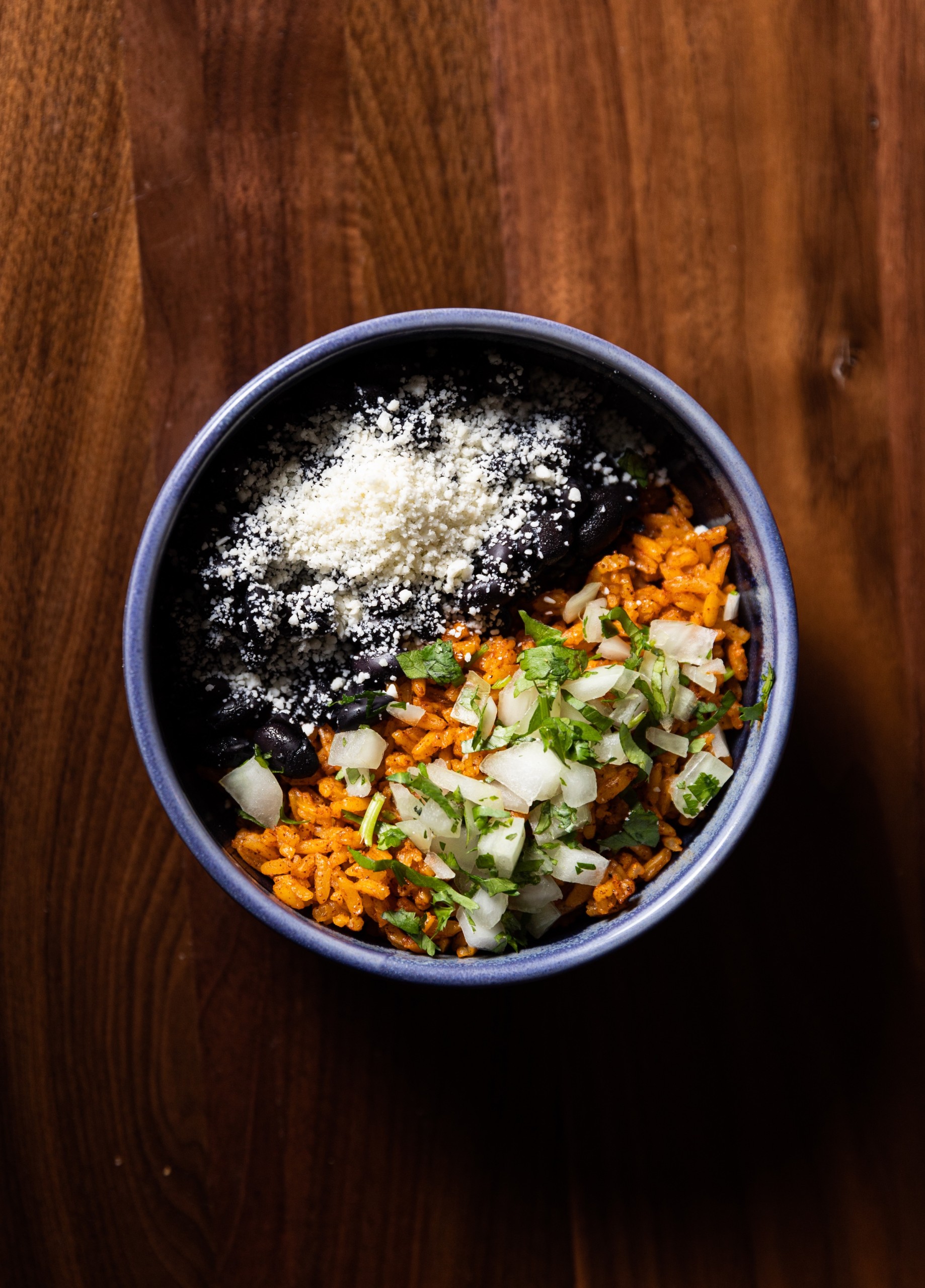 Mexican rice with black beans on wooden table at Masa & Agave of Hotel Ivy